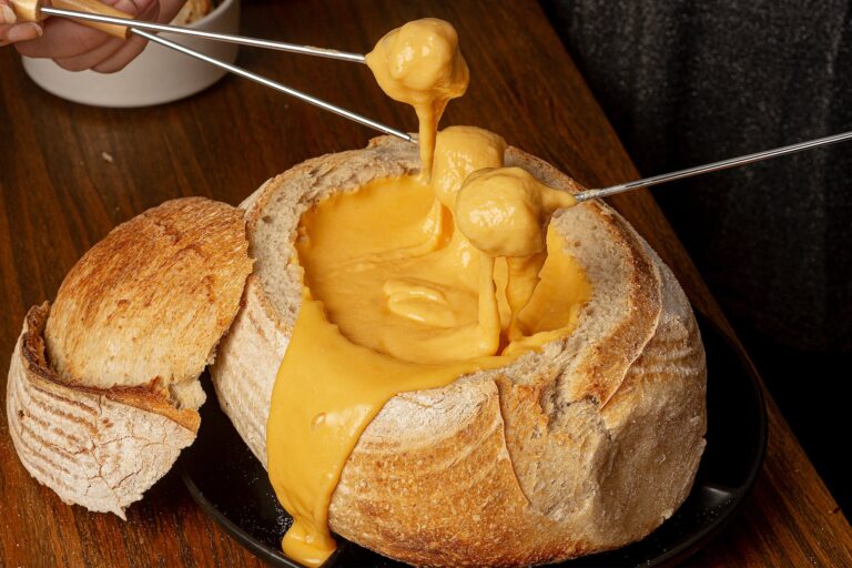 a bread with cheese fondue